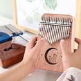 thumbnail image 4 of Thumb Piano, Portable 17 Keys Finger Piano with Tune Hammer and Study Instruction,Musical Instruments Birthday Gift for Kid Adult Beginners Professional(Brown), 4 of 8
