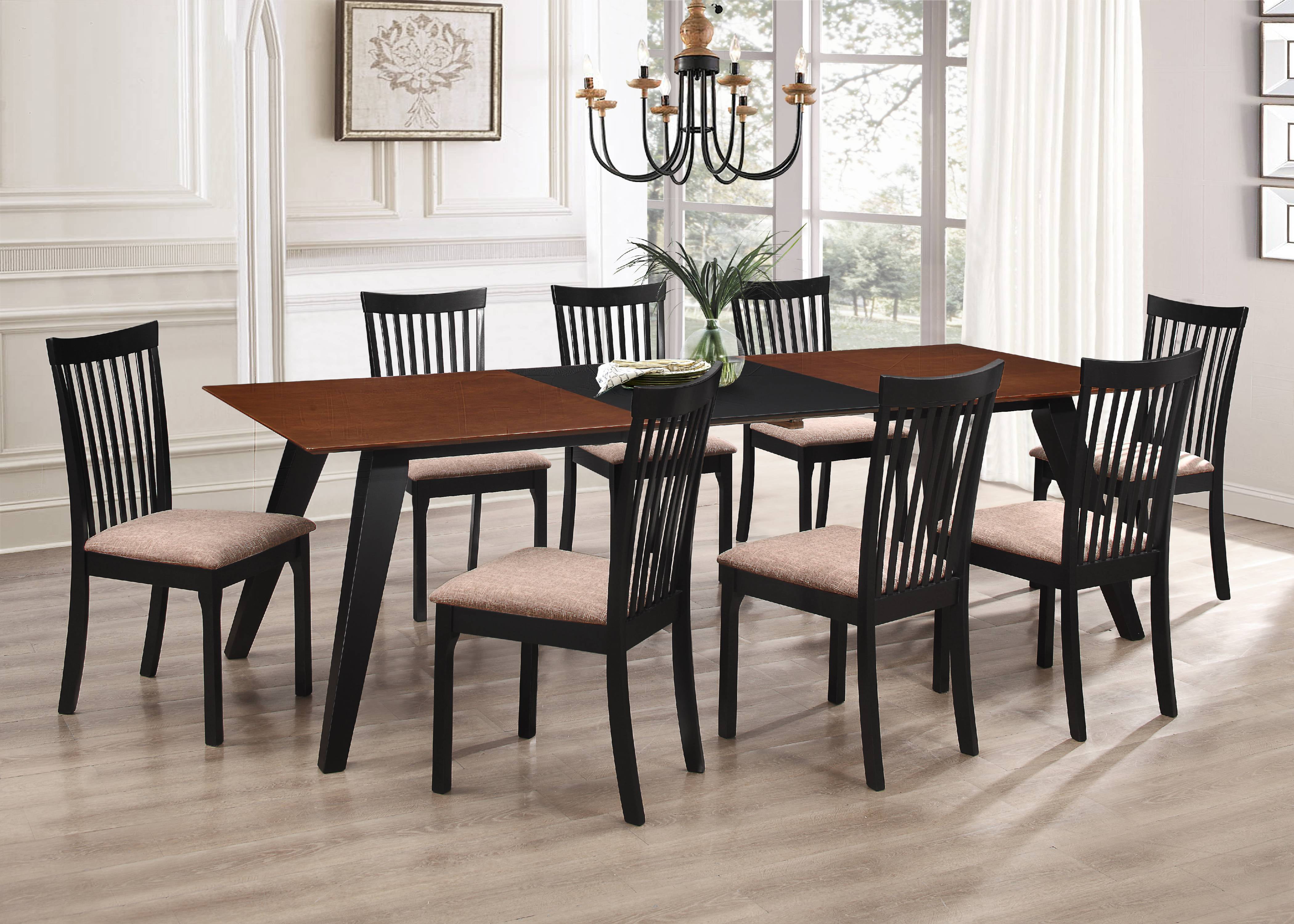 Dining Room With Wood Table And Black Chairs