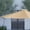Tan, variant on Merrick Lane Teal 9' Round UV Resistant Outdoor Patio Umbrella With Height Lever And 33° Push Button Tilt