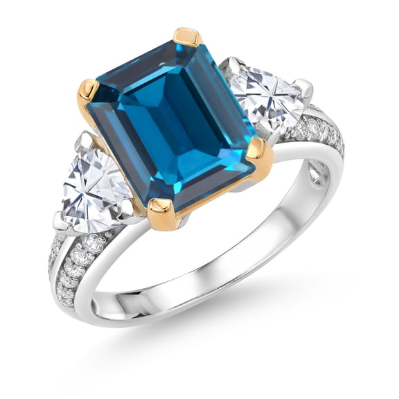 Gem Stone King 5.13 Cttw London Blue Topaz and White Moissanite 3 Stone Engagement Ring for Women | 925 Sterling Silver and 10k Yellow Gold | Emerald Cut 10X8MM (Size 7)