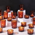 thumbnail image 1 of Portavelas votivos NITIME de cristal ámbar para decoración otoñal (36 unidades), 1 of 7