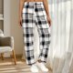 thumbnail image 1 of Pantalones de dormir de franela suave con cintura elástica para mujer, con estampado festivo y bolsillos laterales. Pantalones de poliéster para mujer., 1 of 8