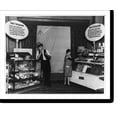 thumbnail image 2 of Historic Framed Print, [Exhibit at candy show in Chicago showing the wrong and right way show cases should be kept to make them attractive, and increase sales], 17-7/8" x 21-7/8", 2 of 9