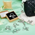 thumbnail image 5 of 16Pcs Planet Astronaut Keychain Alloy Spaceman Rocket Charms Pendants Keyring Space Theme Accessories with Keyring Astronaut Space Party Favors for Backpack Bag Purse Gifts Silver, 5 of 6