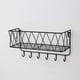 thumbnail image 1 of Una cesta de metal colgada en la pared. Adepaton LKX-0515-4, 1 of 4