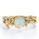 thumbnail image 1 of JeenMata Anillo Nupcial con Diseño de Hoja de Rama de Moissanita y Ópalo de Fuego Redondo de 0,65 Quilates Engastado en Garras con Solitario en Baño de Oro Amarillo de 18 K sobre Plata, 1 of 5