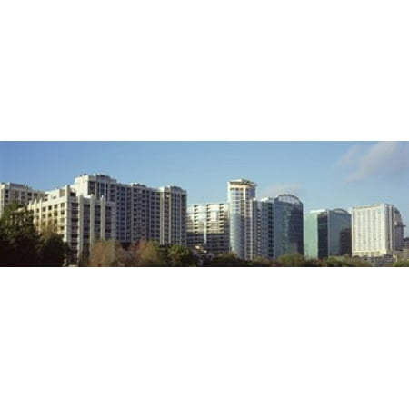 Skyscrapers in a city Lake Eola Orlando Orange County Florida USA Poster