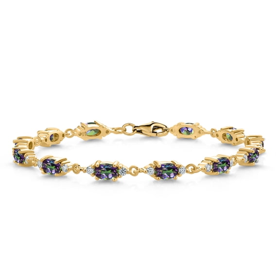 Gem Stone King 18K Yellow Gold Plated Silver Green Mystic Topaz and White Moissanite Tennis Bracelet for Women (8.11 Cttw, Gemstone Birthstone, Oval 6X4MM, 7 inch)
