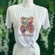 thumbnail image 3 of Playera Blusa Casual Con Impresion De Oso Multicolor Para Mujer Color Blanco Talla Mediana Marca Emil SaEs, 3 of 4