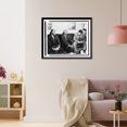 thumbnail image 3 of Historic Framed Print, [Two unidentified African American men seated on a sofa, talking to a young man, possibly a reporter], 17-7/8" x 21-7/8", 3 of 9