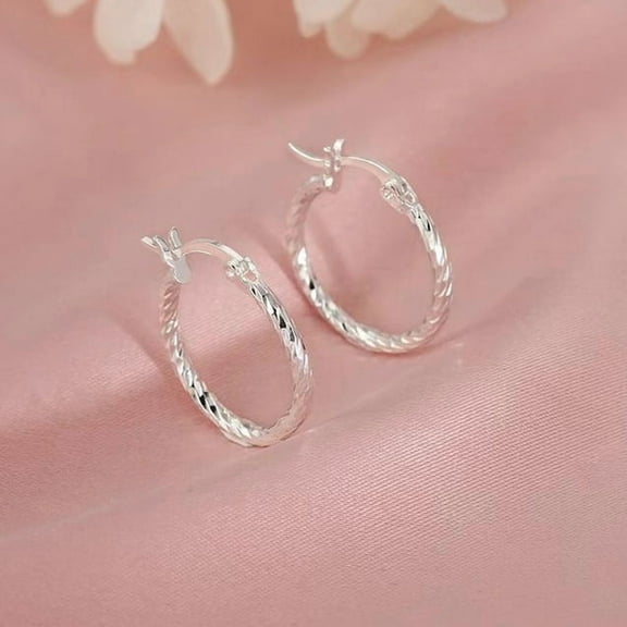Leander's 925 sterling silver hoop earrings and twisted hoop earrings offer ultimate luxury, minimalist chic, and a fresh style, perfect for everyday wear.