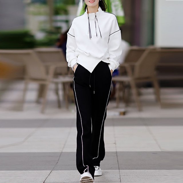 Figura otoño e invierno nuevo suéter holgado y ceñido a la cintura de alta calidad de moda traje deportivo informal de dos piezas para mujer