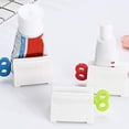 thumbnail image 2 of Exprimidor de pasta de dientes manual con rodillo rojo Efficient Bathroom Aid, 2 of 6