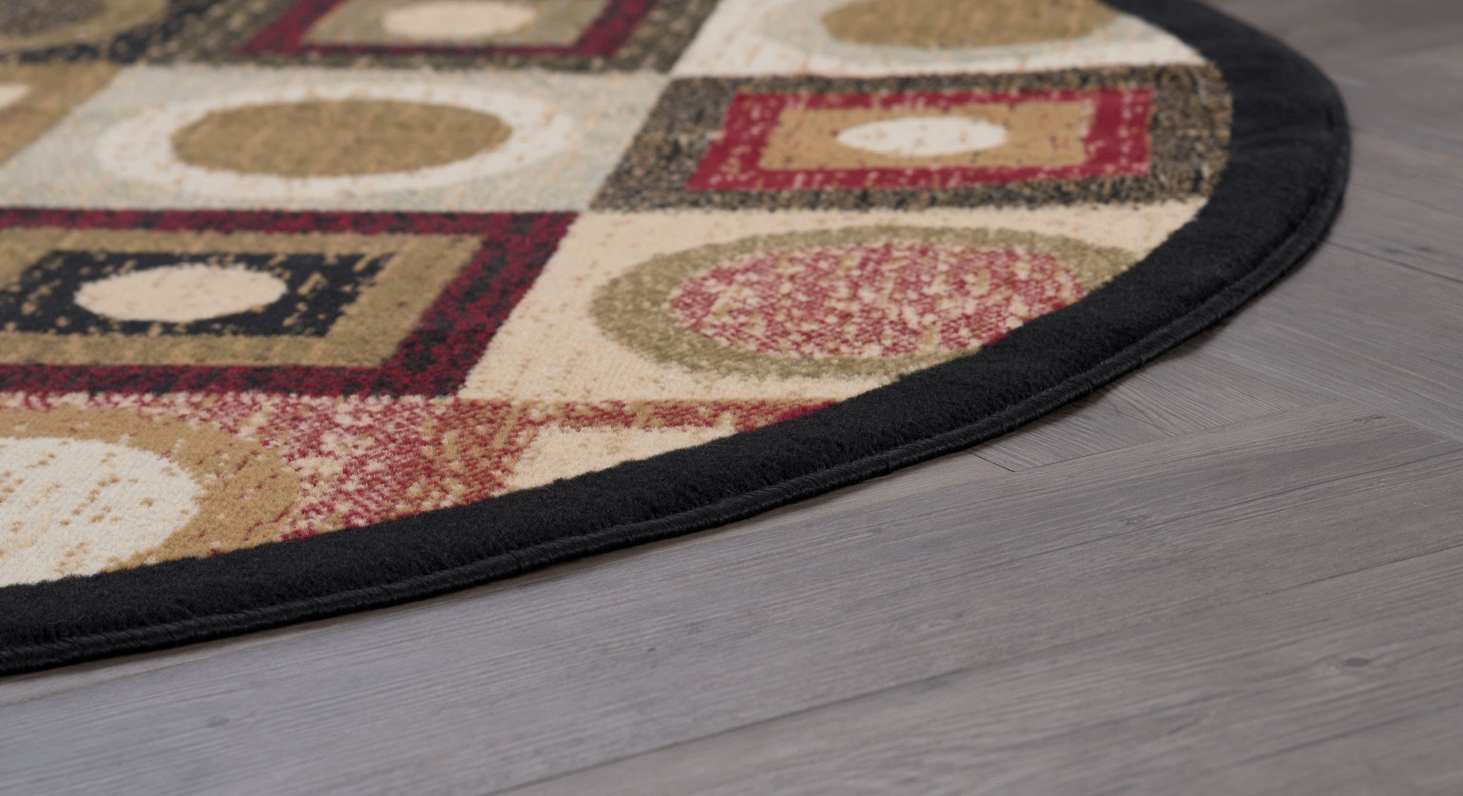 Hampton Contemporary 8' Round Black and Red Polypropylene Indoor Area Rug