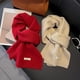 thumbnail image 4 of Bufanda de lana glutinosa suave para mujer, otoño e invierno, bufanda versátil gruesa y cálida de color sólido beige para hombres y mujeres, 4 of 6