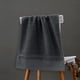 thumbnail image 5 of Toalla de baño grande de algodón, 34 x 74 cm, color liso, para adultos, de secado rápido y muy absorbente, ideal para spa, piscina y gimnasio. Aestivo | Gris oscuro | AESTIVO, 5 of 8