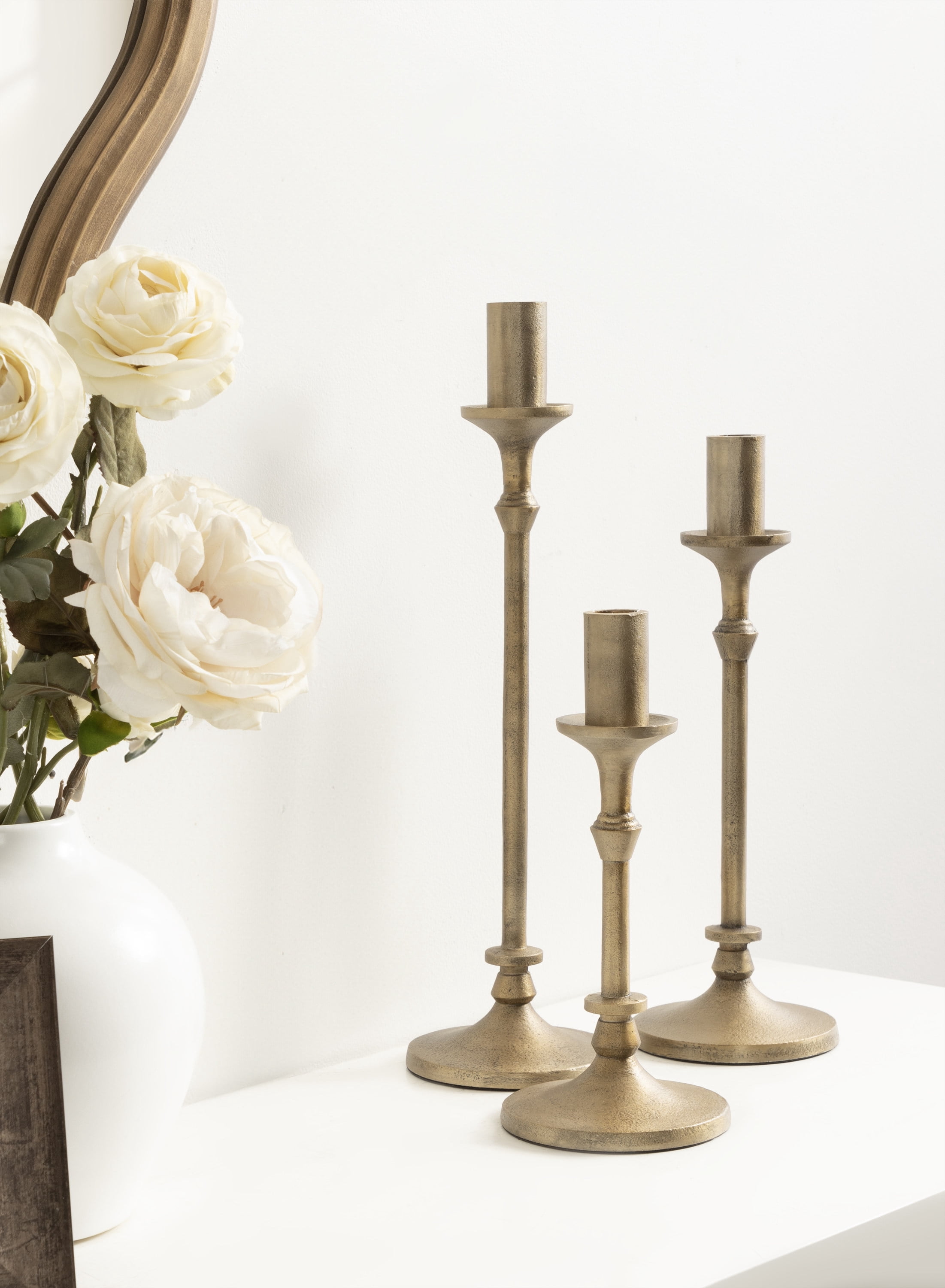 Set di 3 candelieri con forma conica e finitura in ottone vintage