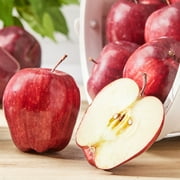 تفاحة لذيذة حمراء طازجة ، كل منها