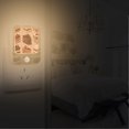 thumbnail image 2 of Yayeee 2-Pack Plug in LED Night Lights with Light Sensors Motion Detectors, Brown Cakes, 2 of 7