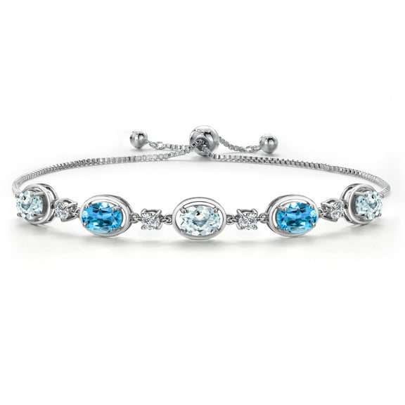 Gem Stone King 925 Sterling Silver Sky Blue Aquamarine and Swiss Blue Topaz and Moissanite Tennis Bracelet for Women | 4.25 Cttw | Gemstone March Birthstone | Oval 7X5MM | Fully Adjustable 10 inch