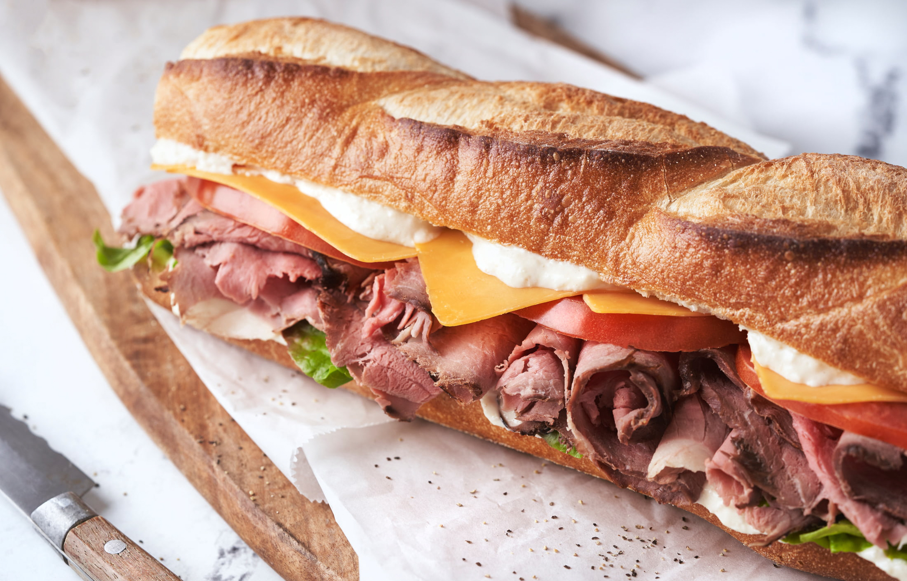 Thumann's Top Round Roast Beef (Pork), Deli Sliced, Plastic Bag, 2 oz. (56g), and 14g