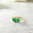 thumbnail image 4 of Gem Stone King 10K Yellow Gold Green Simulated Emerald and Diamond Accent 3-Stone Engagement Ring | 1.42 Cttw | Oval 7X5MM & 6X4MM | Three Stone Wedding Anniversary Gold Ring for Women (Size 5), 4 of 4