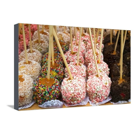 Hand Dipped Caramel Apples in Chocolate and Nuts. Street Food Stretched Canvas Print Wall Art By
