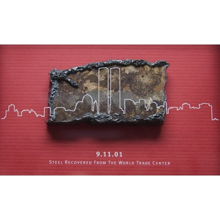 World Trade Center Steel - Steel recovered from the World Trade Center is displayed aboard the amphibious transport dock ship Poster Print 24 x 36