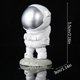 thumbnail image 2 of Xihbxyly Decoración de Astronauta de Resina, Estilo Espacial Moderno, Diseño Artístico Único, Decoración Versátil para El Hogar, Sala de Estar y Dormitorio, Estable y Resistente, Tamaño 15 X 10 Cm., 2 of 2