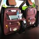 thumbnail image 1 of Bolsa de almacenamiento de cuero para asiento de automóvil, bolsa de almacenamiento multifuncional para mesa de comedor plegable para automóvil, suministros para el interior del automóvil, 1 of 5