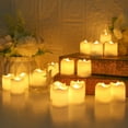 thumbnail image 4 of Flameless Votive Candles,Flameless Flickering Electric Fake Candle, 12 Pack 200+Hour Battery Operated LED Tea Lights in Warm White for Wedding, Table, Halloween,Christmas Decorations 1.42"X1.83", 4 of 9