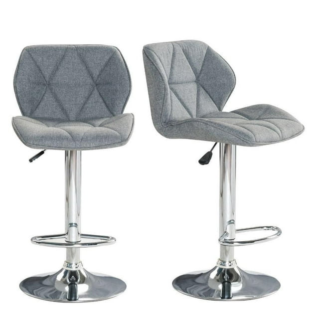 Set of two grey tufted kitchen stools with shiny chrome bases, footrests, and adjustable height levers.