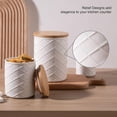 thumbnail image 3 of Ceramic Canisters Sets for Kitchen Countertop, Relief Food Storage Jar with Bamboo Lid, Stackable Container for Flour, Coffee, Pasta, Cereal, Tea, Cookies, Sugar, Spices, Pack of 4 (White), 3 of 7