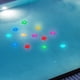 thumbnail image 1 of Cubitos de hielo que cambian de color Star Glow | Paquete de 12 | Luces LED Estrellas de plástico con purpurina reutilizables | 6 Colores | Funciona con pilas | Resistente al agua | Para la, 1 of 8