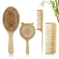 thumbnail image 1 of Set 4 en 1 de cepillo y peine de bambú para todo tipo de cabello con cepillos de masaje de madera., 1 of 5