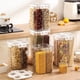 thumbnail image 1 of Contenedor de almacenamiento multigrano de 4 compartimentos | Dispensador de grano plástico hermético de grado alimentario | Tarro transparente sellado, resistente a la humedad, gran capacidad, 1 of 8