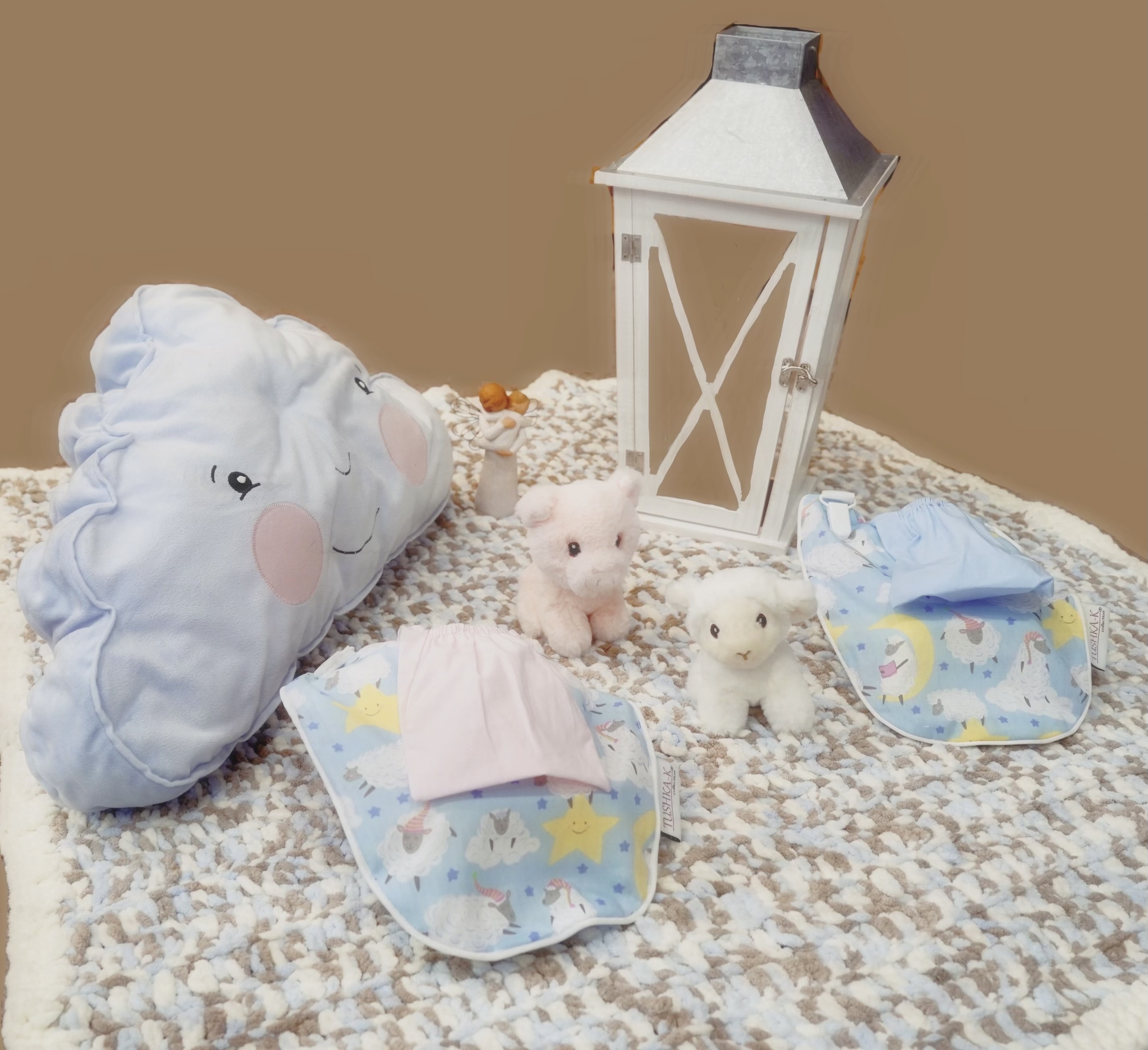 The Bottle Bib-Lullaby Collection Pink Keeps baby bottles, food pouches and training cups, from falling onto dirty surfaces!  Hands free Feeding! Check it out!
