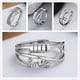 thumbnail image 5 of Anillo giratorio Joker con personalidad de moda europea y americana, anillo de dedo cruzado multicírculo con diseño inteligente para mujer, 5 of 6