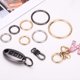 thumbnail image 5 of Uxcell 16 Pcs Anillos de resorte metálicos, 1"/26mm Anillo de resorte de disparo Clips redondos Gancho de resorte para llavero, bolso, colgante, correa de bolso, manualidad DIY, Plata-Blanco, 5 of 6