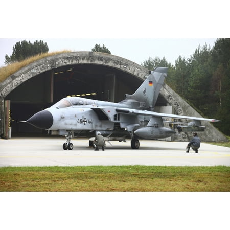 Ground crew conducting pre-flight-checks on a German Tornado ECR armed with an HARM missile in front of its shelter Poster (Best Above Ground Tornado Shelter)
