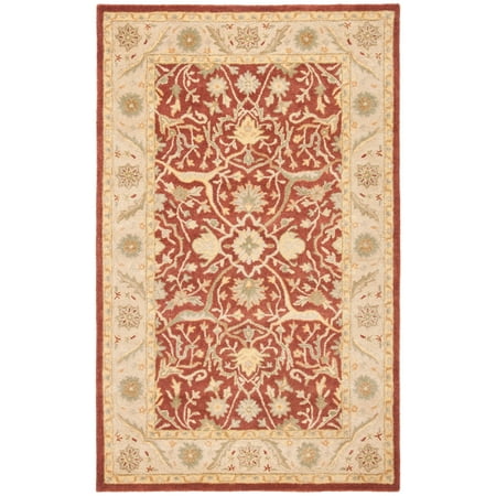 Safavieh SAFAVIEH Antiquity Collection AT14C Handmade Rust Rug SAFAVIEH Antiquity Collection AT14C Handmade Rust Rug The refined look of antique Persian rug design is masterfully revived for today s extraordinary home decor in the Antiquity Rug Collection. Rich colors and evocative motifs lend heirloom qualities to classy-casual and traditional room decor  with a special herbal wash enhancing the marvelous aged patina of this collection. These rugs are expertly hand-tufted of 100% premium wool. Rug has an approximate thickness of 0.5 inches. For over 100 years  SAFAVIEH has set the standard for finely crafted rugs and home furnishings. From coveted fresh and trendy designs to timeless heirloom-quality pieces  expressing your unique personal style has never been easier. Begin your rug  furniture  lighting  outdoor  and home decor search and discover over 100 000 SAFAVIEH products today.
