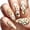 A, variant on 24PCS Medium Long Almond Easter Press On Nails, Pastel Base with Bunny, Easter Egg, Tulip & Floral Design, Glossy Natural Fit Fake Nails for Women, Spring Holiday & Daily Manicure, Salon & Home Use
