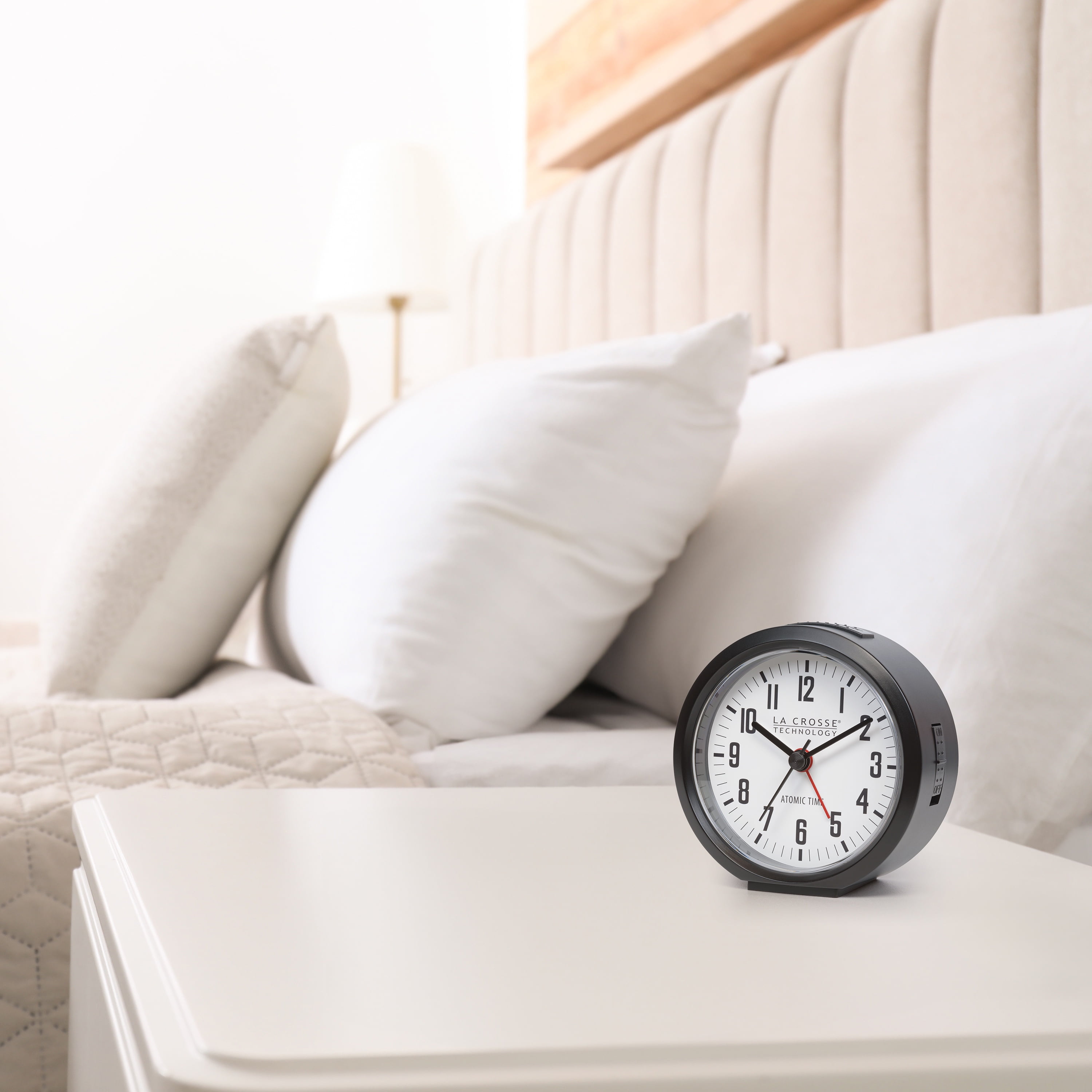 La Crosse Technology 4" Round Black Atomic Analog Alarm Clock, 617-710B