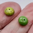 thumbnail image 2 of Gaspeite High Grade 7mm Rondelle | 7mm | Green Brown | 2 Beads, 2 of 12