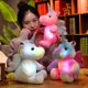 thumbnail image 4 of Juguetes de peluche de unicornio con luz LED brillante, almohada de Animal de unicornio sentado luminoso, muñeca de peluche Kawaii para niños, regalos de Navidad, 25CM, 4 of 4
