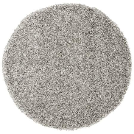 Safavieh SAFAVIEH California Shag Collection SG151-7575 Silver Rug SAFAVIEH California Shag Collection SG151-7575 Silver Rug SAFAVIEH s California Shag Collection imparts breezy coastal vibes throughout room decor. These plush pile shags are made using high-quality synthetic yarns  machine-woven into luxurious shag textures and colored in vivid hues with stylishly speckled tonal colors. These superior non-shedding shag rugs add flowing dimension to any decor  and are also well-suited for higher-traffic areas of the home with frequent kid or pet activity. Perfect for the living room  dining room  bedroom  study  home office  nursery  kid s room  or dorm room. Rug has an approximate thickness of 2 inches. For over 100 years  SAFAVIEH has set the standard for finely crafted rugs and home furnishings. From coveted fresh and trendy designs to timeless heirloom-quality pieces  expressing your unique personal style has never been easier. Begin your rug  furniture  lighting  outdoor  and home decor search and discover over 100 000 SAFAVIEH products today.