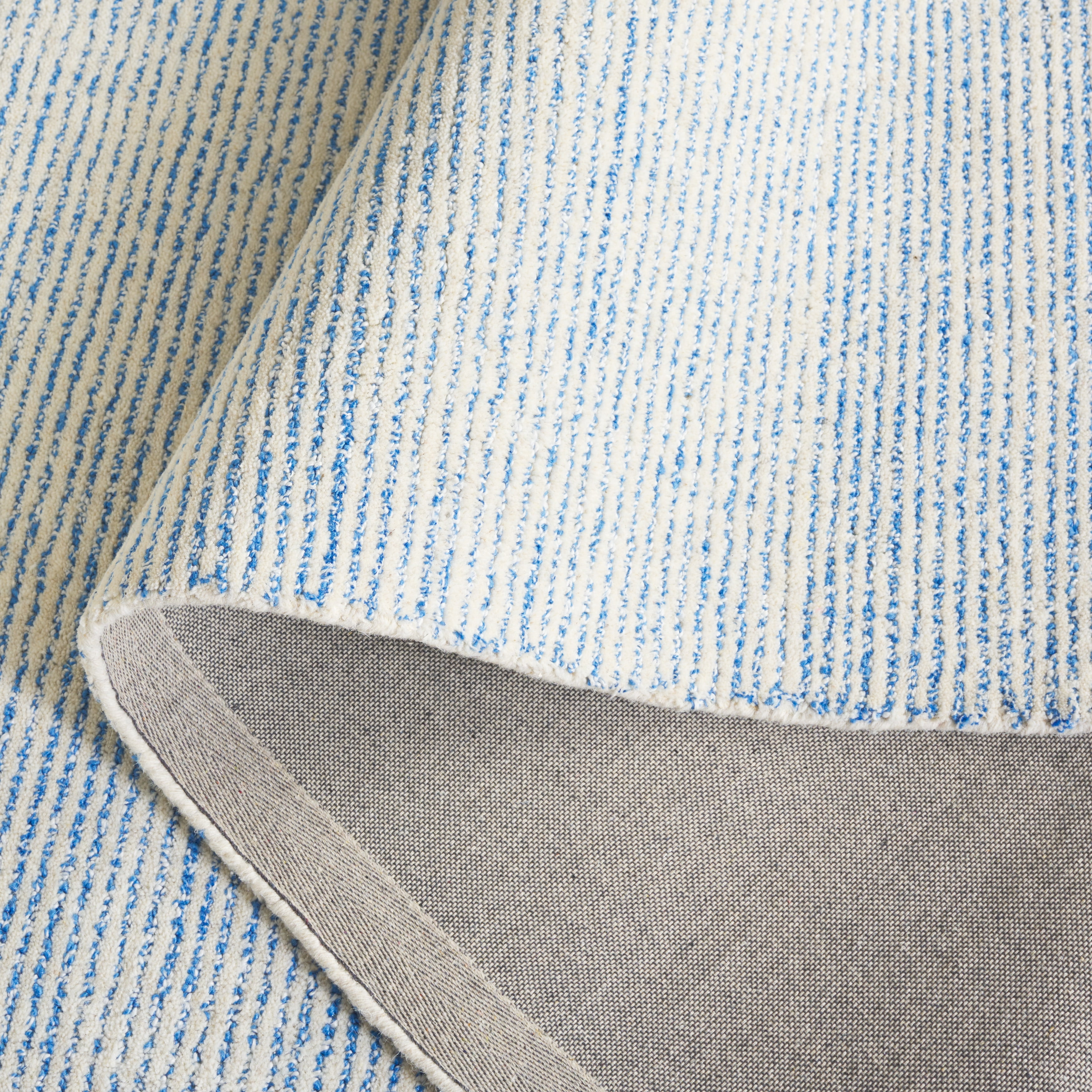 SAFAVIEH Abstract Rumen Solid Color Area Rug, Ivory/Blue, 3' x 5'
