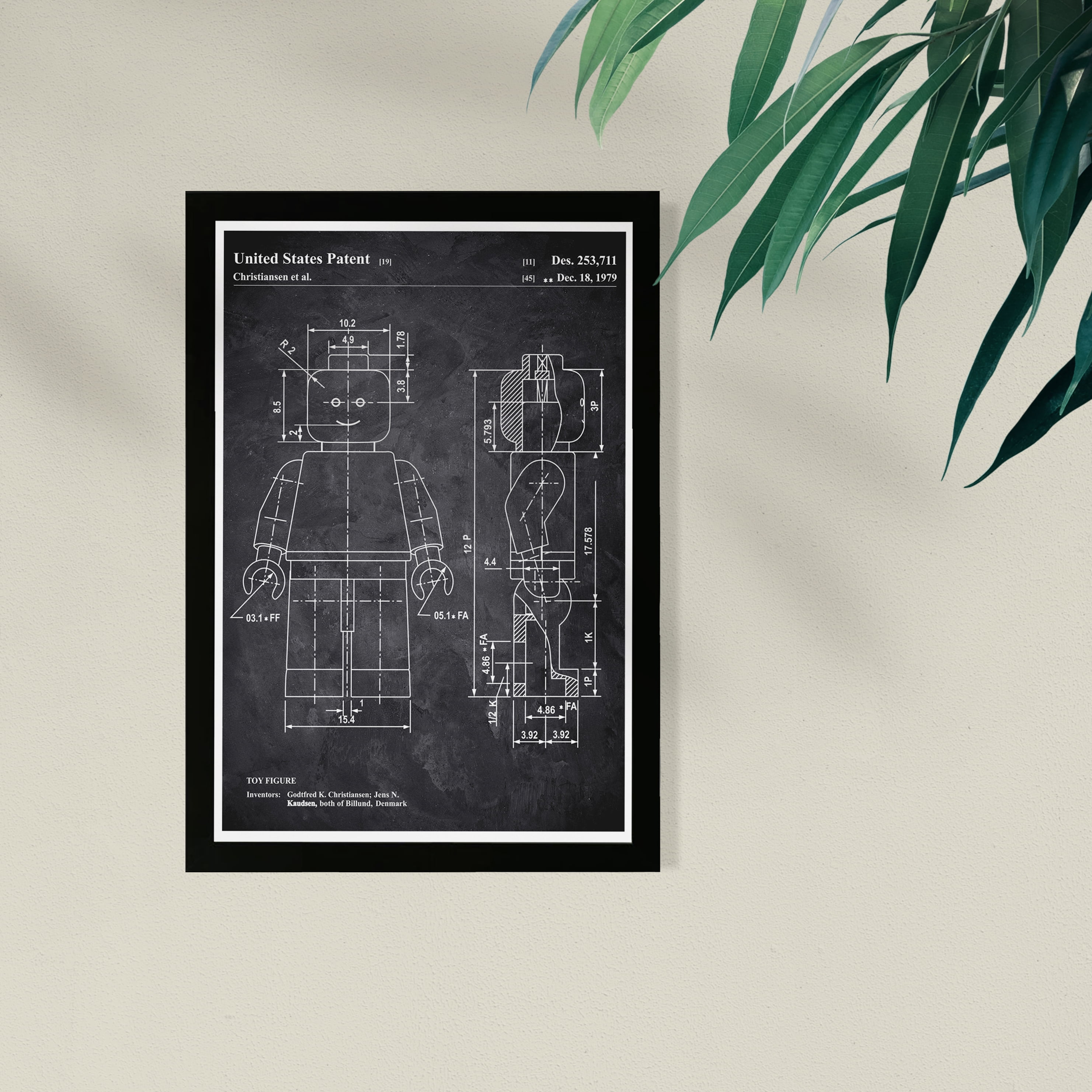Wynwood Studio Entertainment and Hobbies Framed Wall Art Prints 'Lego Toy Figure 1979 Chalkboard' Toys Home Décor - Black, White, 13" x 19"