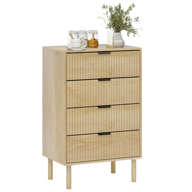 HOMCOM Bedroom Chest of Drawers, 4 Drawer Dresser with Fluted Panels, Oak. This Scandinavian-style dresser features sleek fluted panels, black metal handles, and four spacious drawers for versatile storage. Made with robust particleboard, pine wood legs, and a melamine surface, it offers durability and style. The elevated bottom allows for easy cleaning, and anti-slip foot pads protect floors. Dimensions: 23.6 inches wide, 15.6 inches deep, and 37.8 inches high.