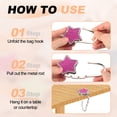 thumbnail image 4 of Uxcell Foldable Purse Hook for Table, 2Pcs Metal Bag Holder Hooks Star Shape Portable Handbag Hangers Hooks for Home Office Purse Handbag Headphone Keys, Purple, 4 of 7